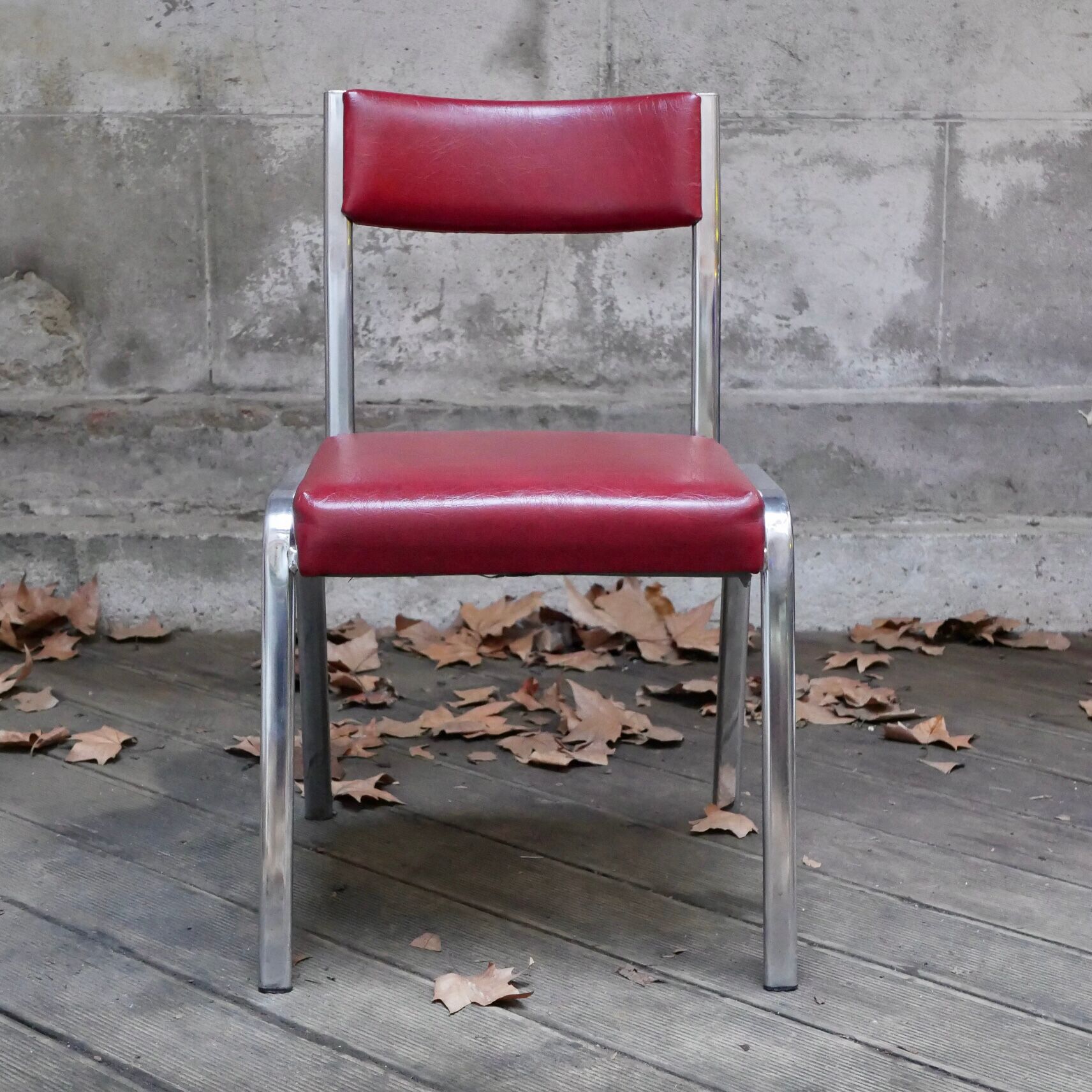 Pair of red leatherette chairs