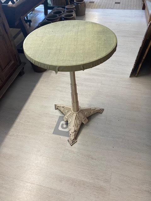 Round table with cast iron stand