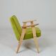 Fauteuil vintage en velours vert poire, bois naturel huilé.