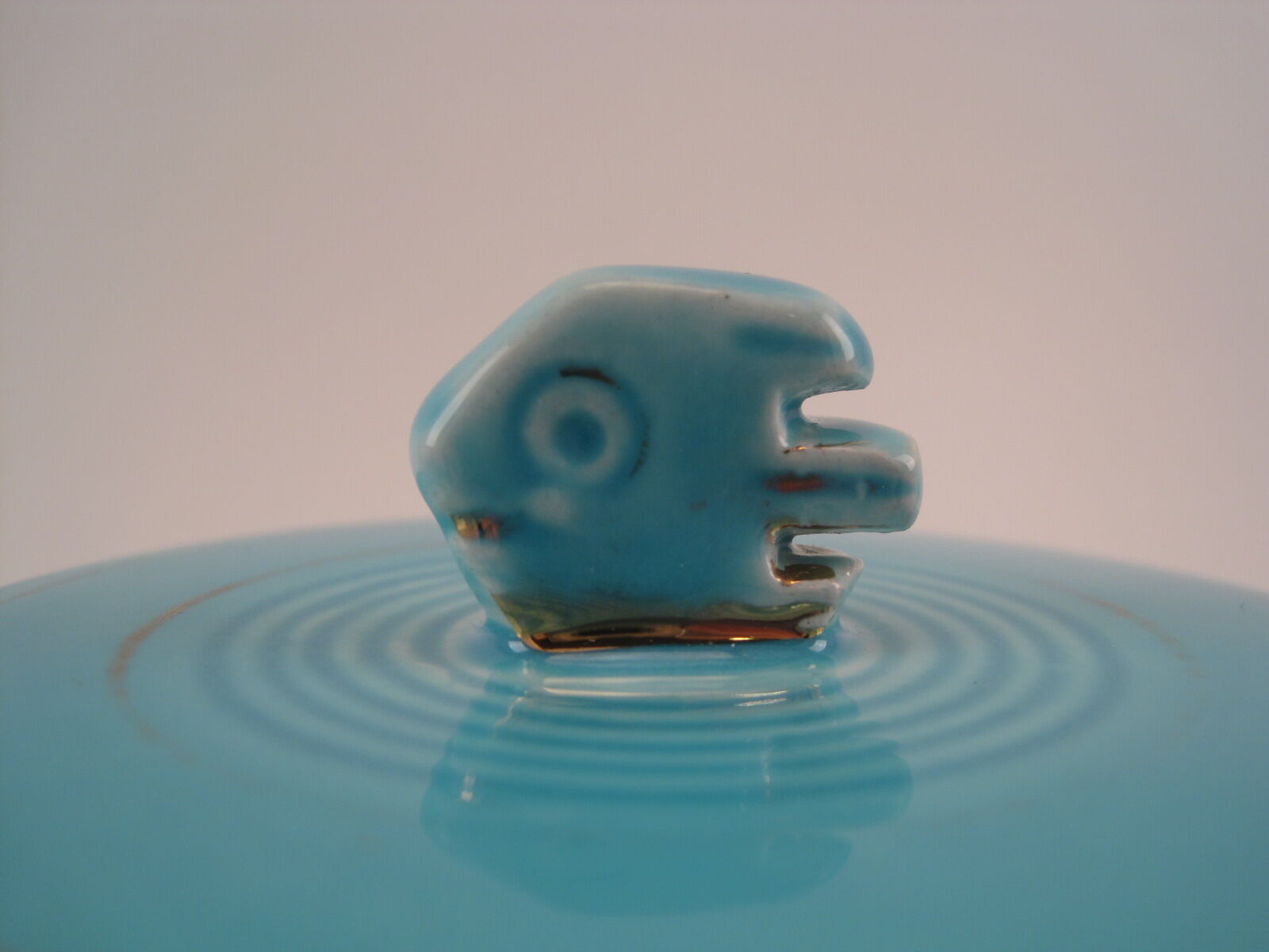 Turquoise blue earthenware candy box decorating stylized frieze fish Art Deco