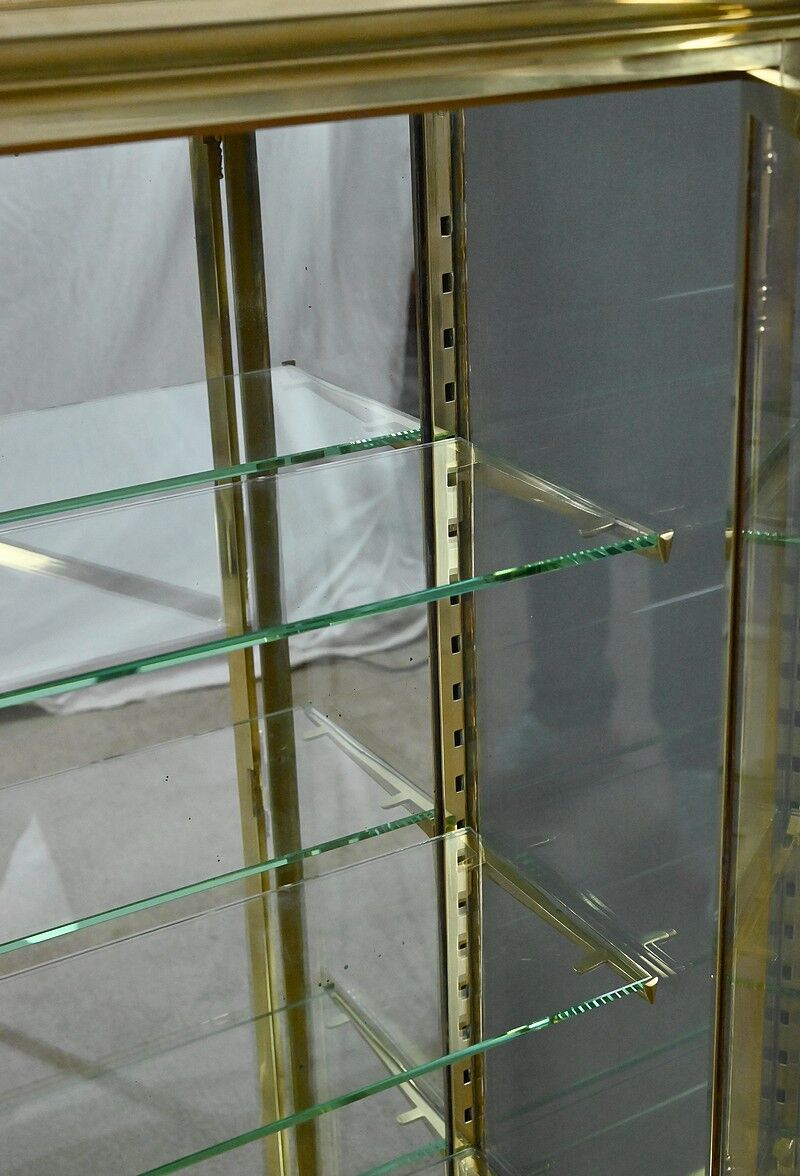 Brass display cabinet with a mirrored back – early 20th century