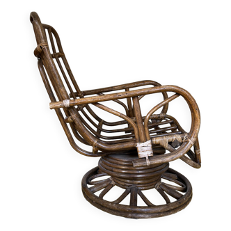 Fauteuil pivotant des années 60 en rotin