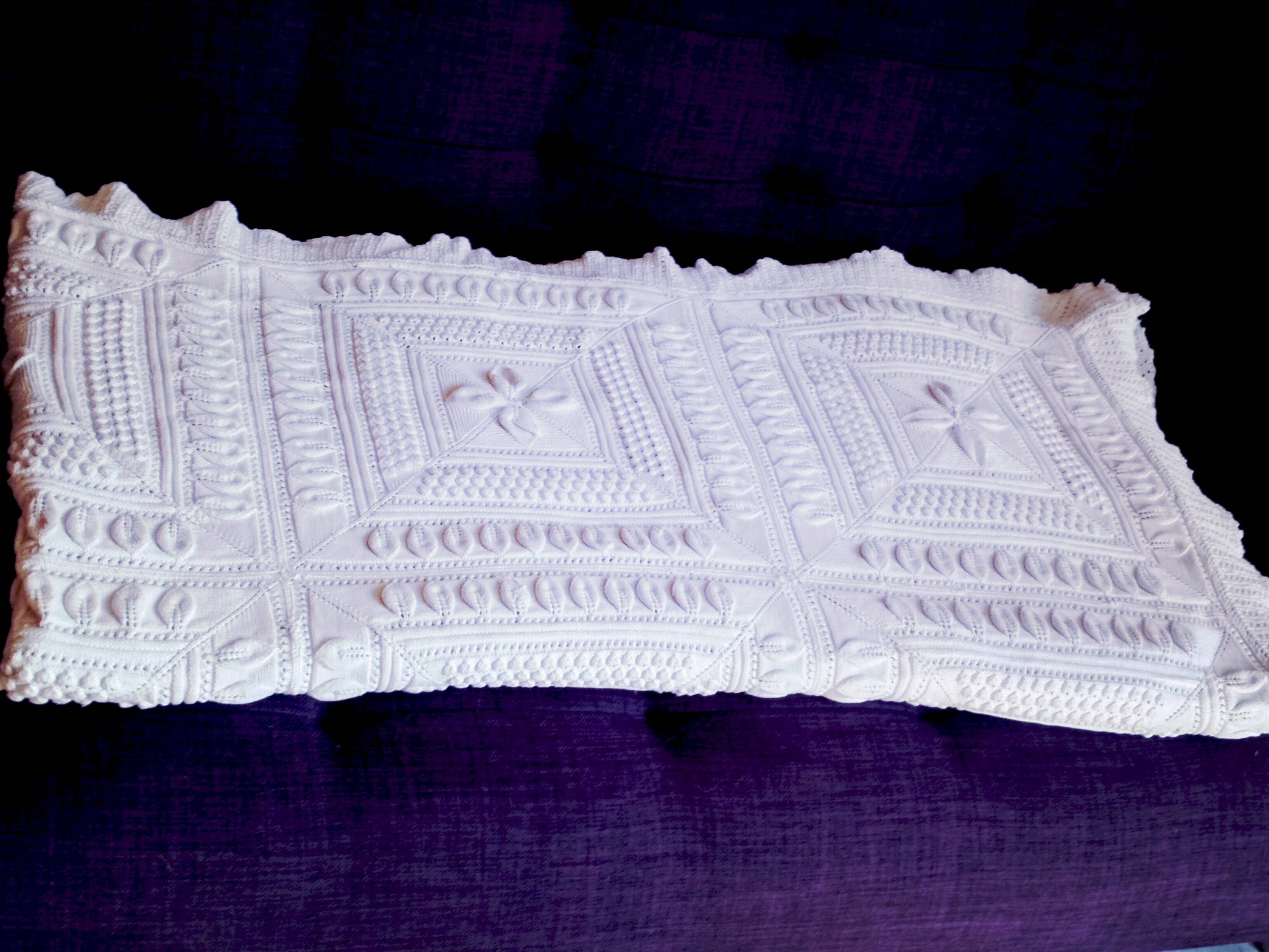 Knitted white cotton bedspread