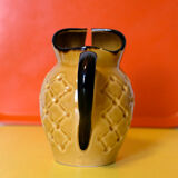 Vintage dabbling pitcher