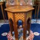 Thuyawood tea table with marquetry decoration.