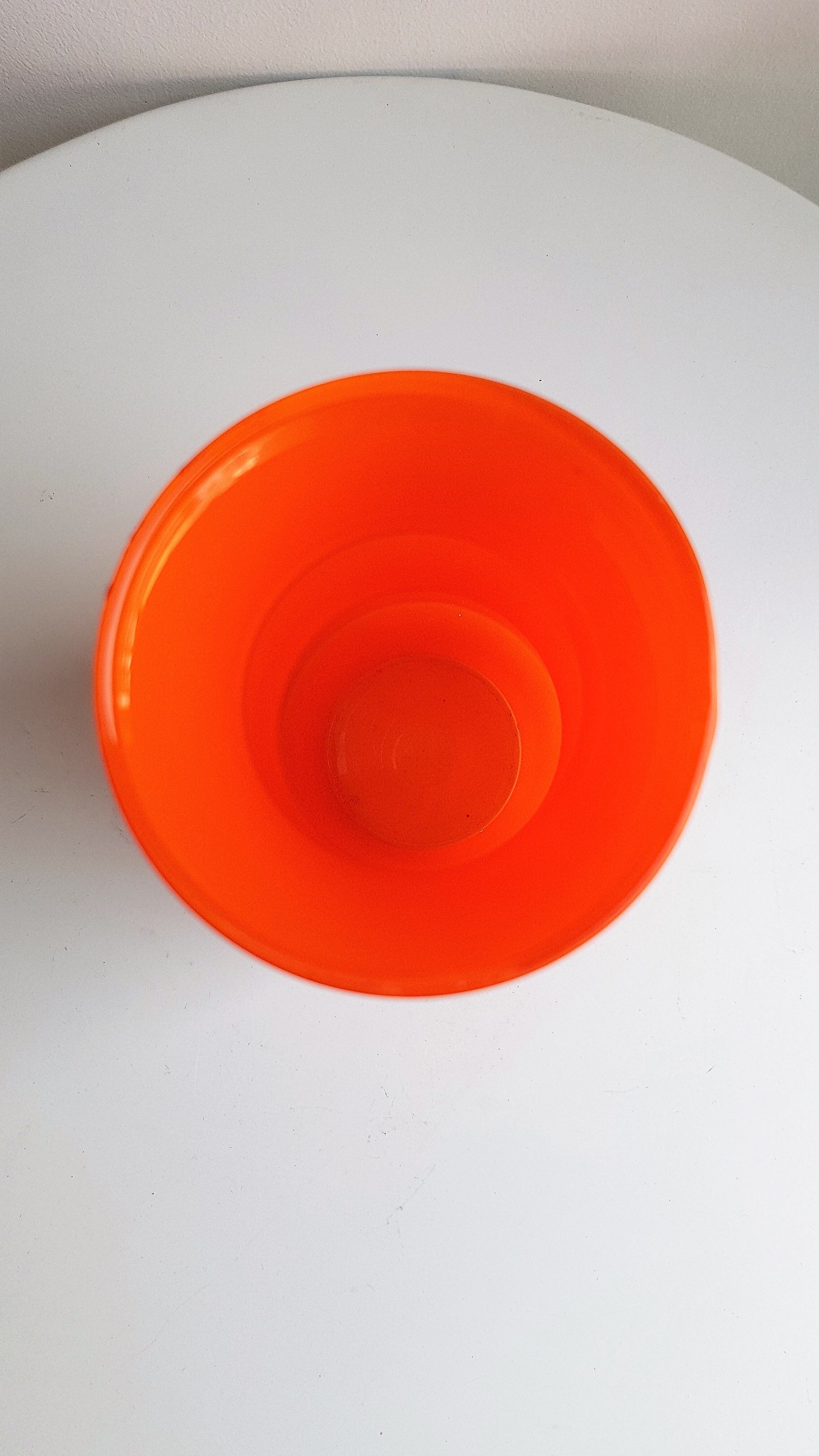 Vintage vase in orange glass