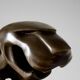 Large Art Deco bronze patinated Jaguar sculpture on an architectural base.