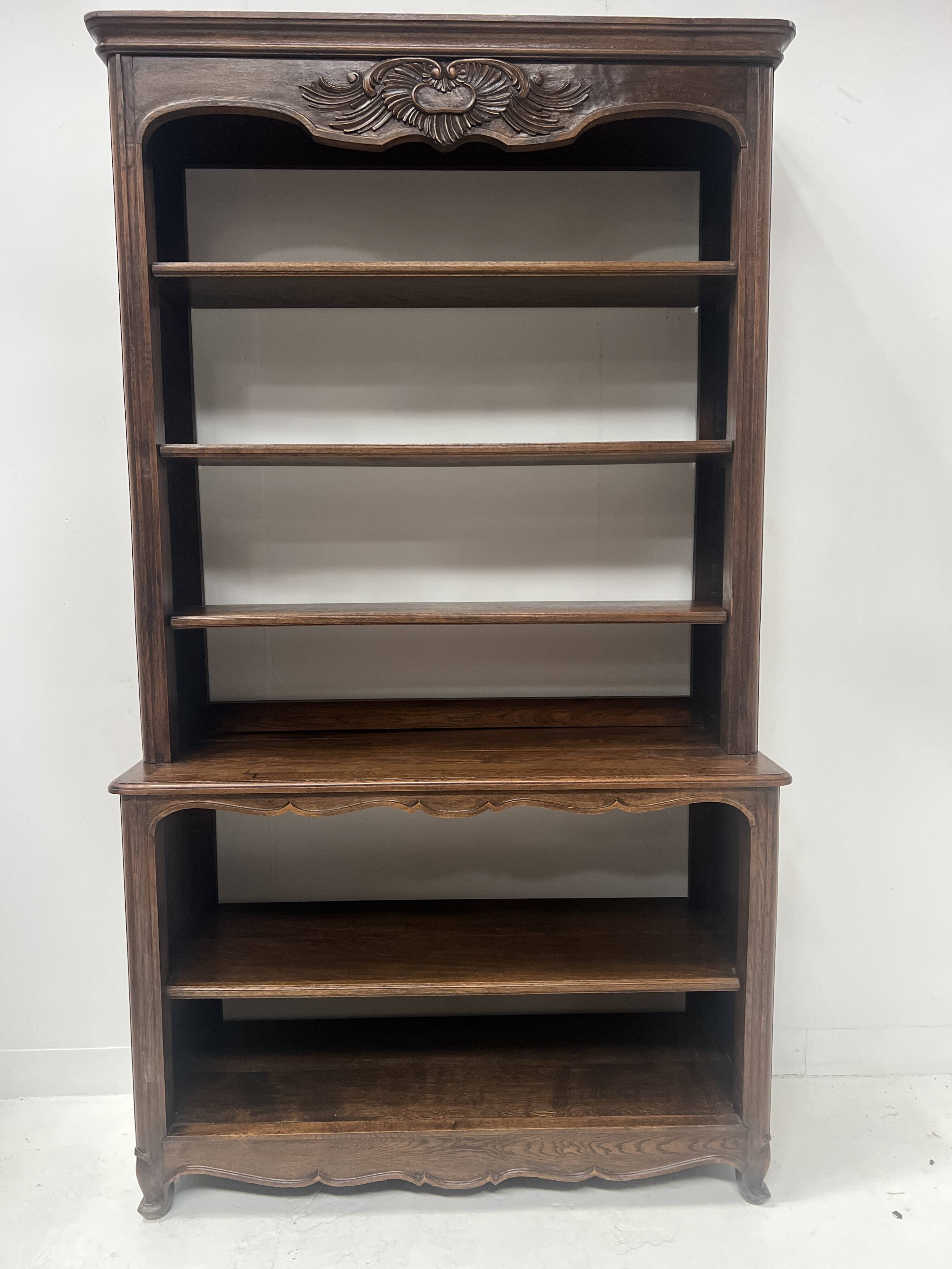Wall library in two sections in Louis XV style made of solid oak, 20th century.