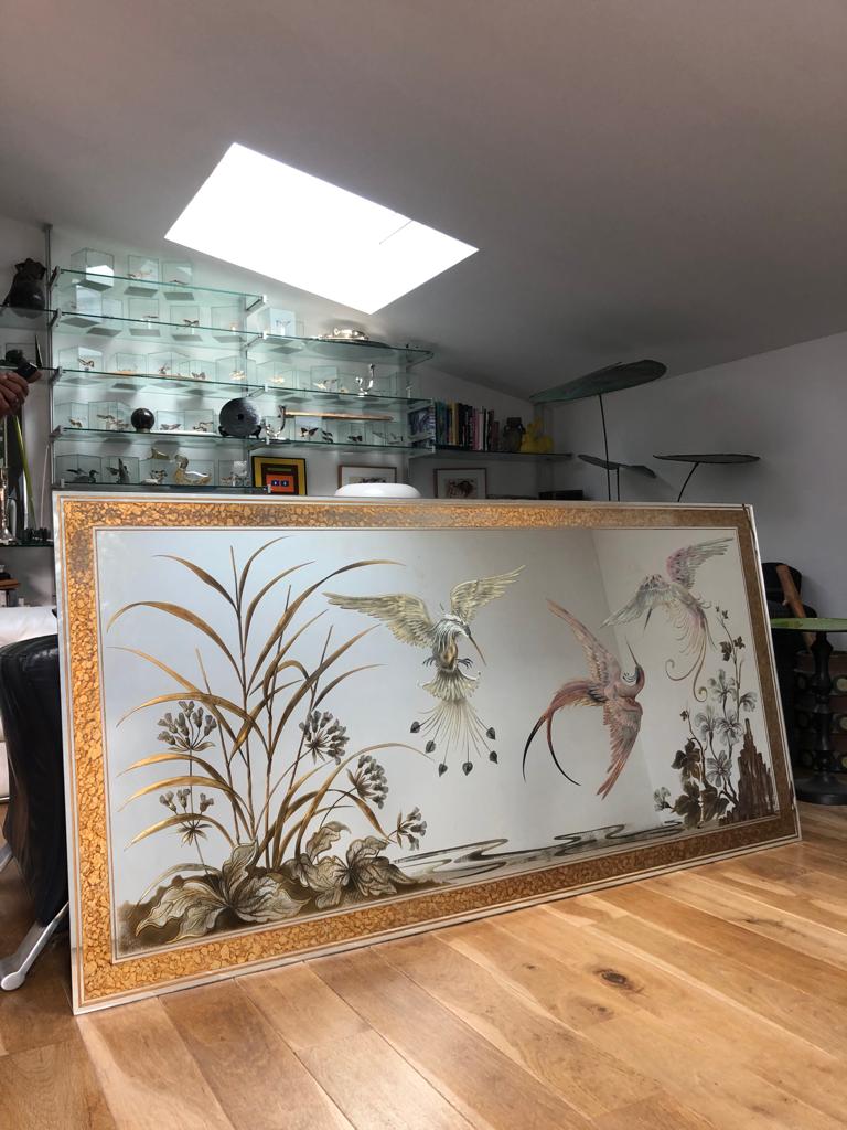 Mirror decorated with birds