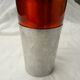 Vase en métal orange et gris