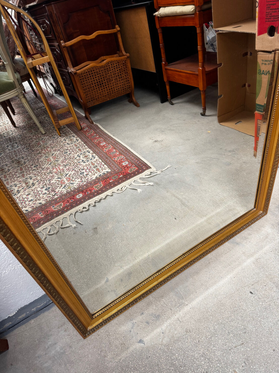 Large gold mirror in the Louis XVI style