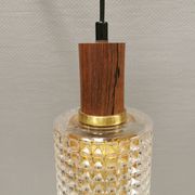 Older Swedish hanging lamp in multi-layered crystal glass with rosewood top and brass ring.