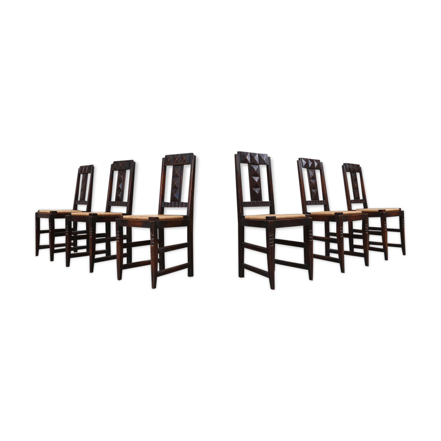 Set of six oak an wicker dining chairs by Victor Courtray