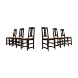 Set of six oak an wicker dining chairs by Victor Courtray