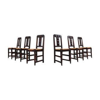 Set of six oak an wicker dining chairs by Victor Courtray