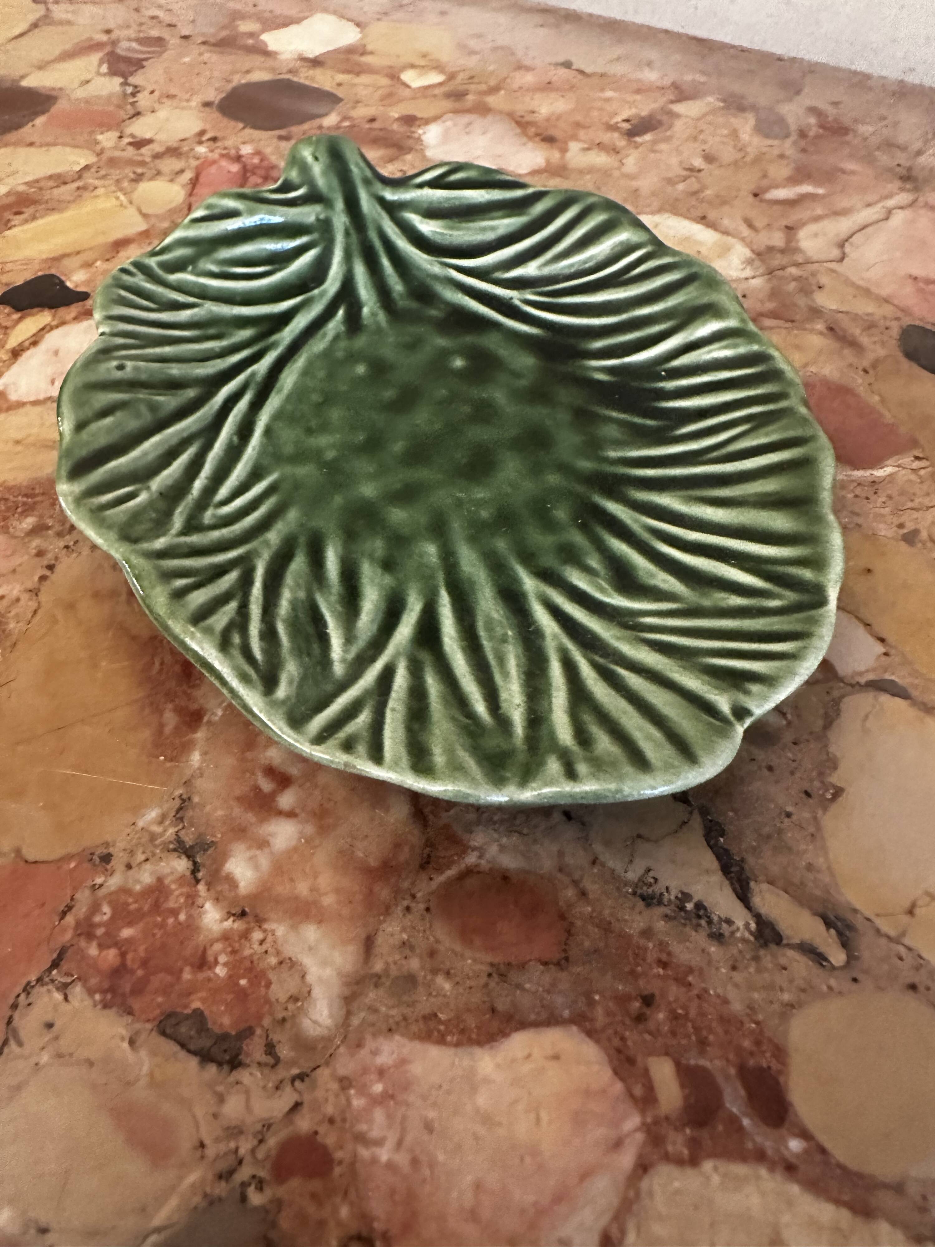 Vintage leaf-shaped green majolica catchall.