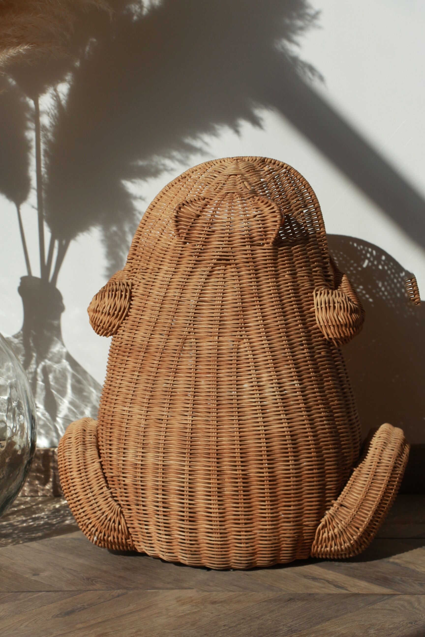 Wicker frog magazine rack by Olivier Cajan