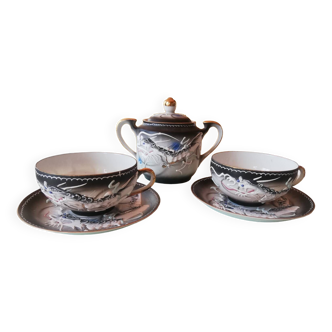 Kutani porcelain teacups and sugar bowl