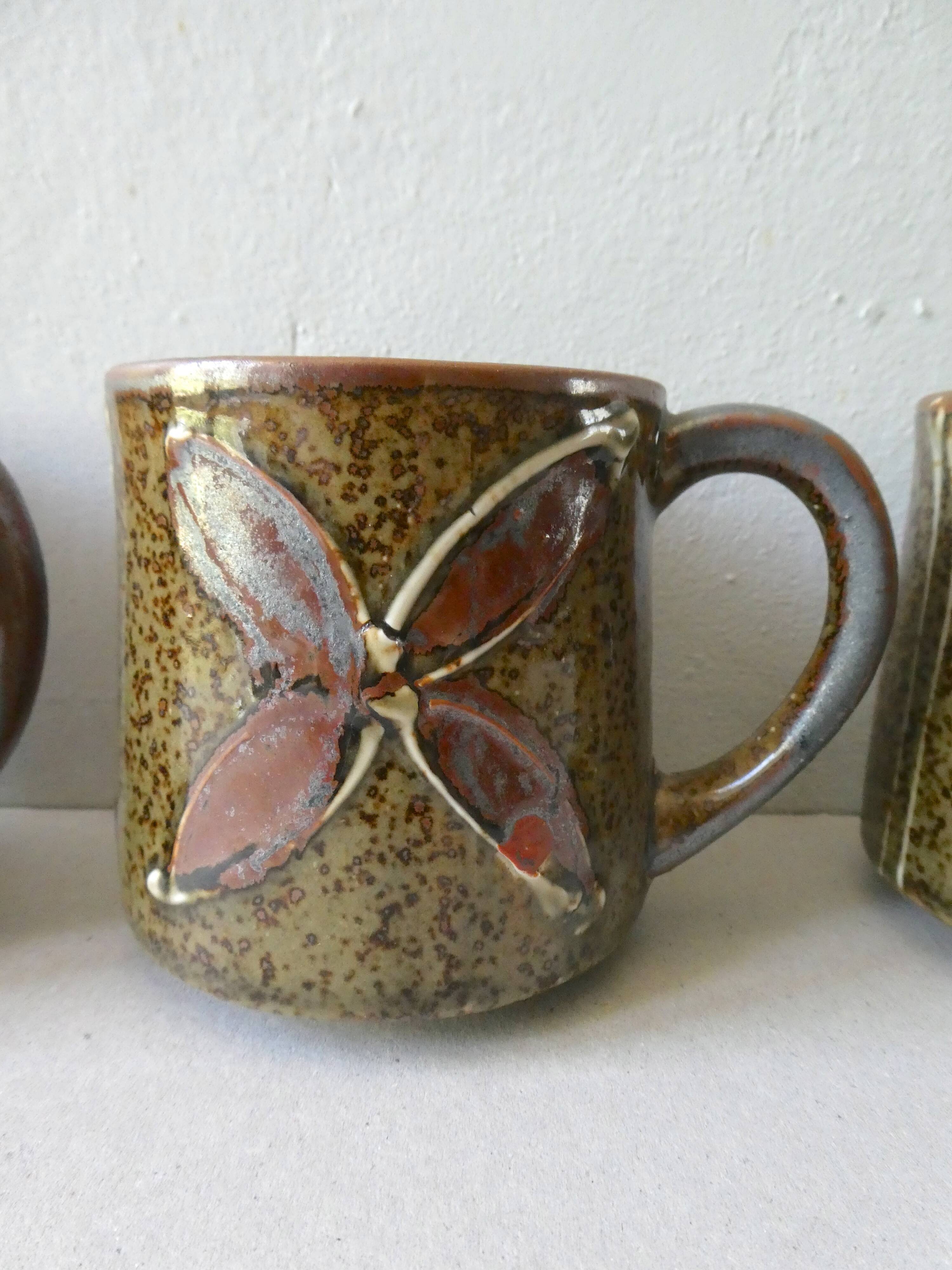 Set of 4  sandstone mugs 70 years