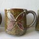 Set of 4  sandstone mugs 70 years