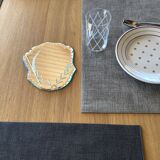 Bevelled mirror engraved under vase or bottle