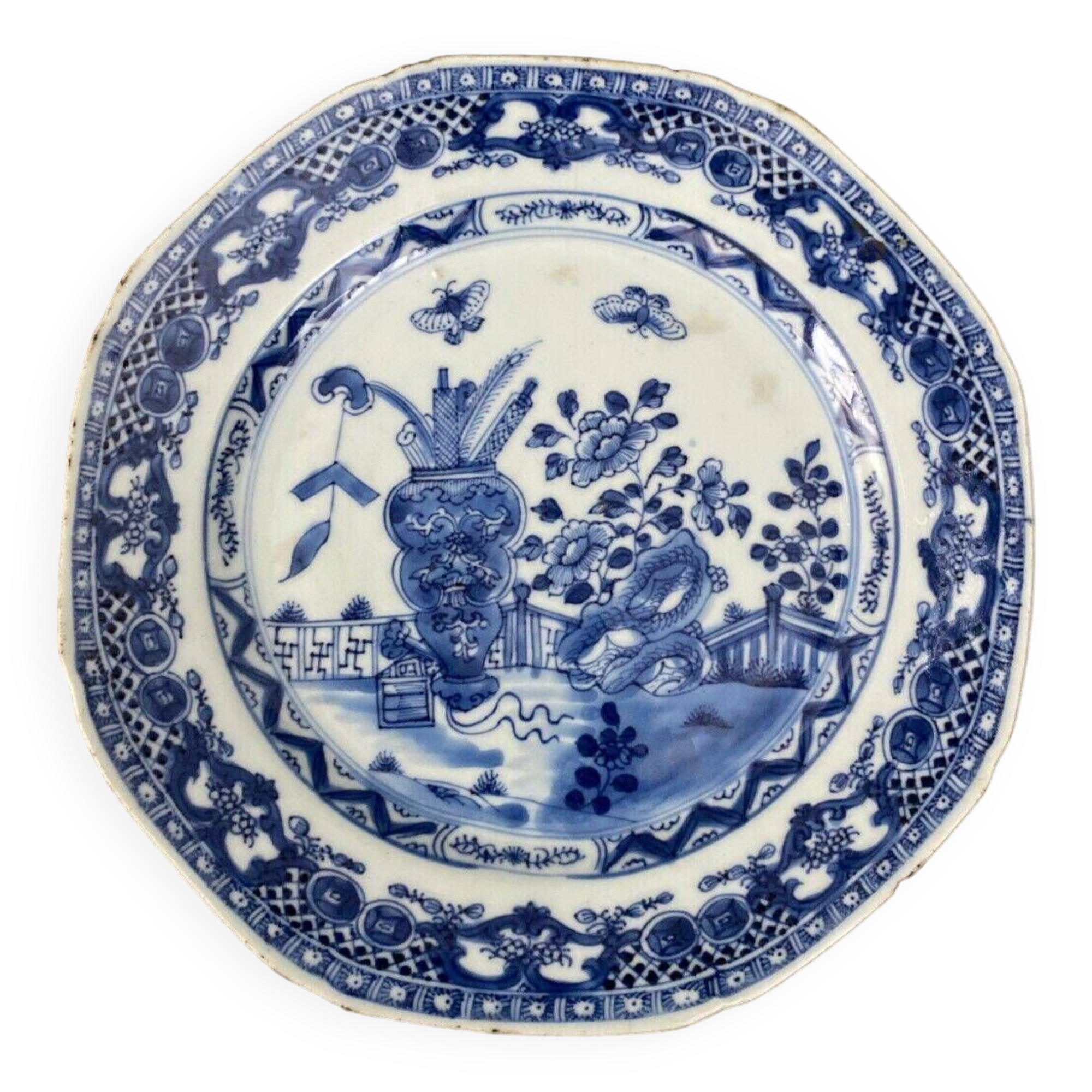 Blue and white China plate decorated with butterflies late 19th century