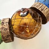 Fishing floats made of blown glass, cork, and rope. France, 1960s.