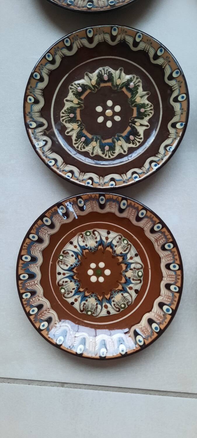 Hand painted pottery plates