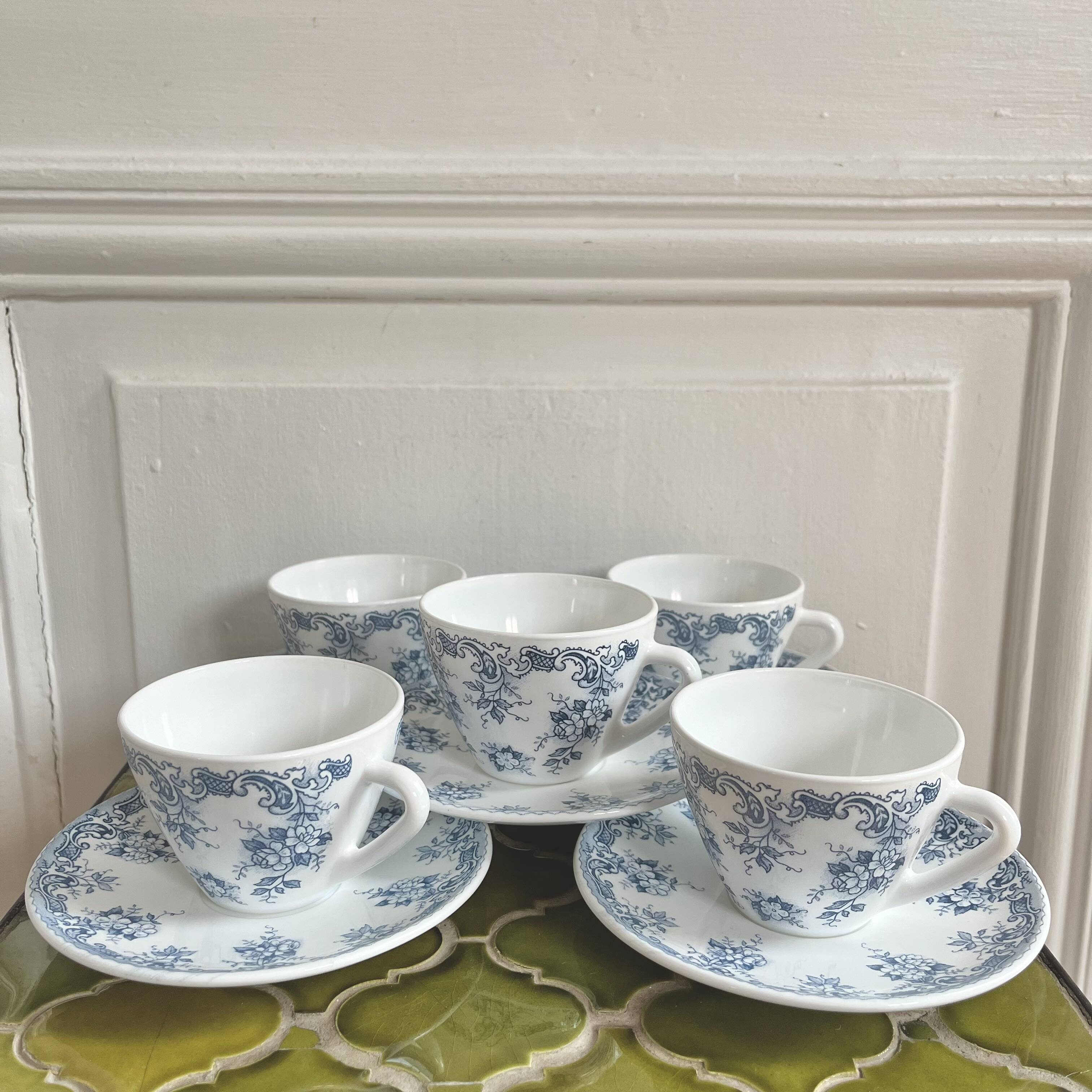 5 coffee cups with blue flower decor from the 70s
