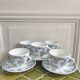 5 coffee cups with blue flower decor from the 70s