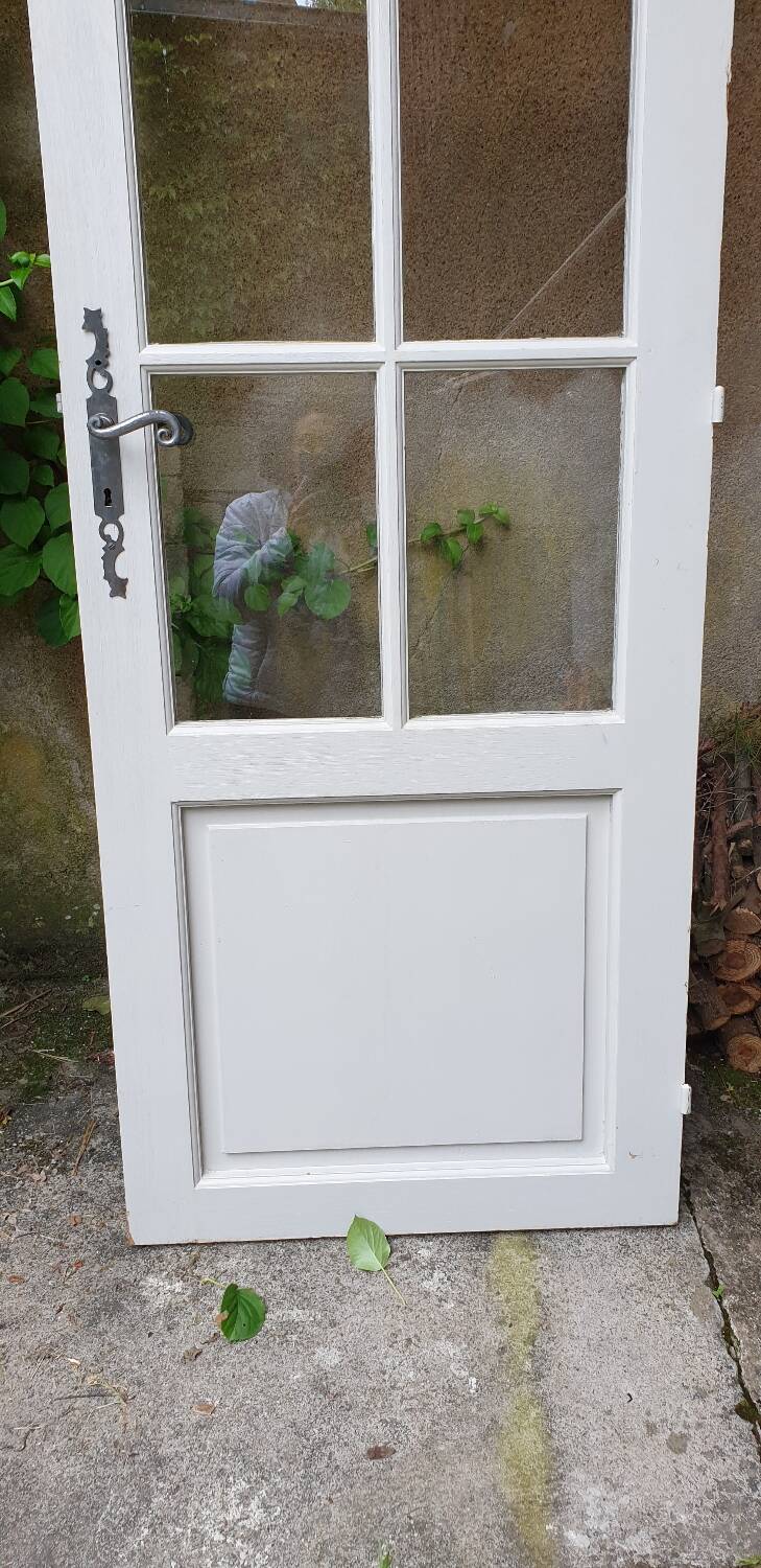 Old wooden door with small squares