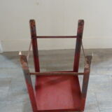 Red metal workshop stool
