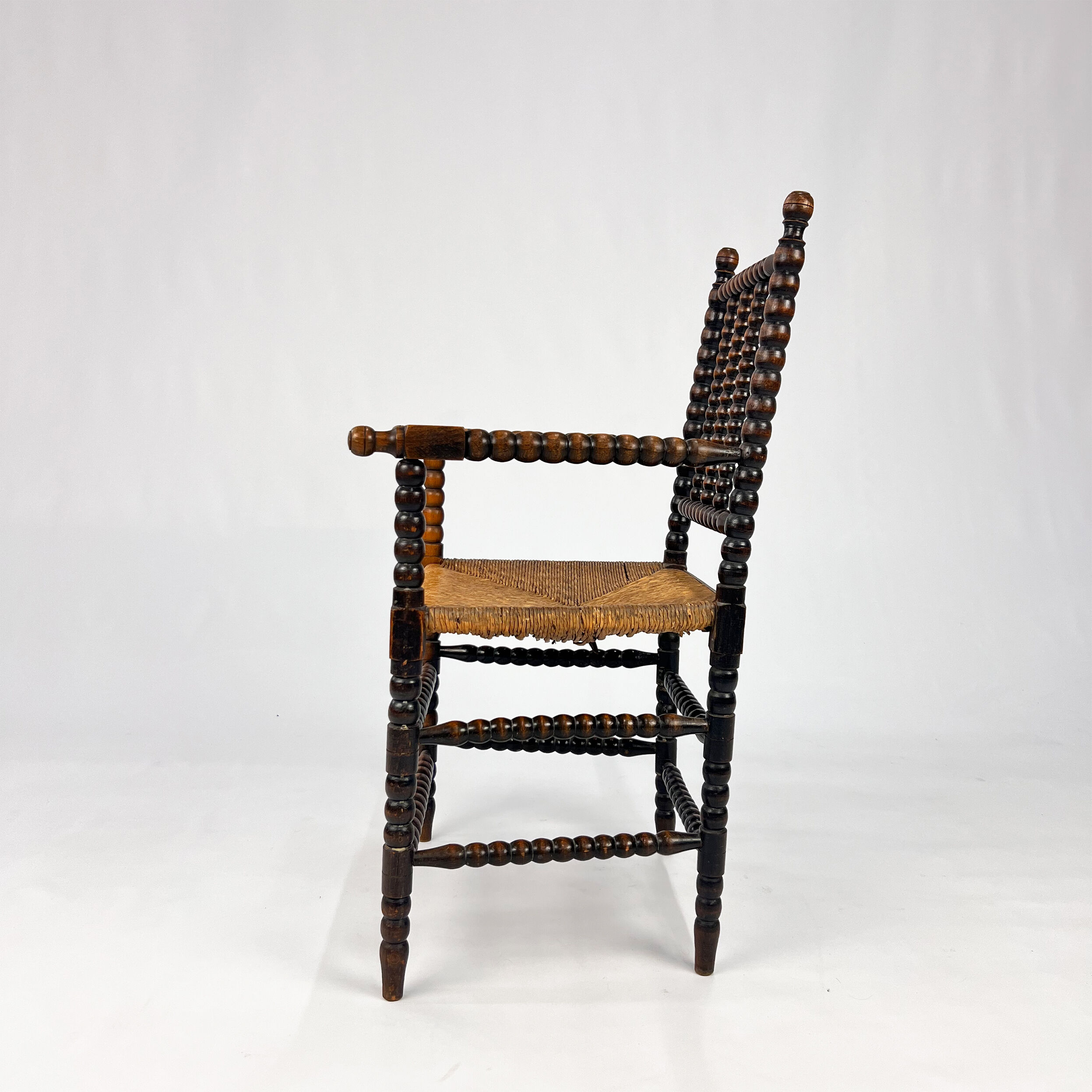 Stained beechwood bobbin armchair in jacobean style, 1900s