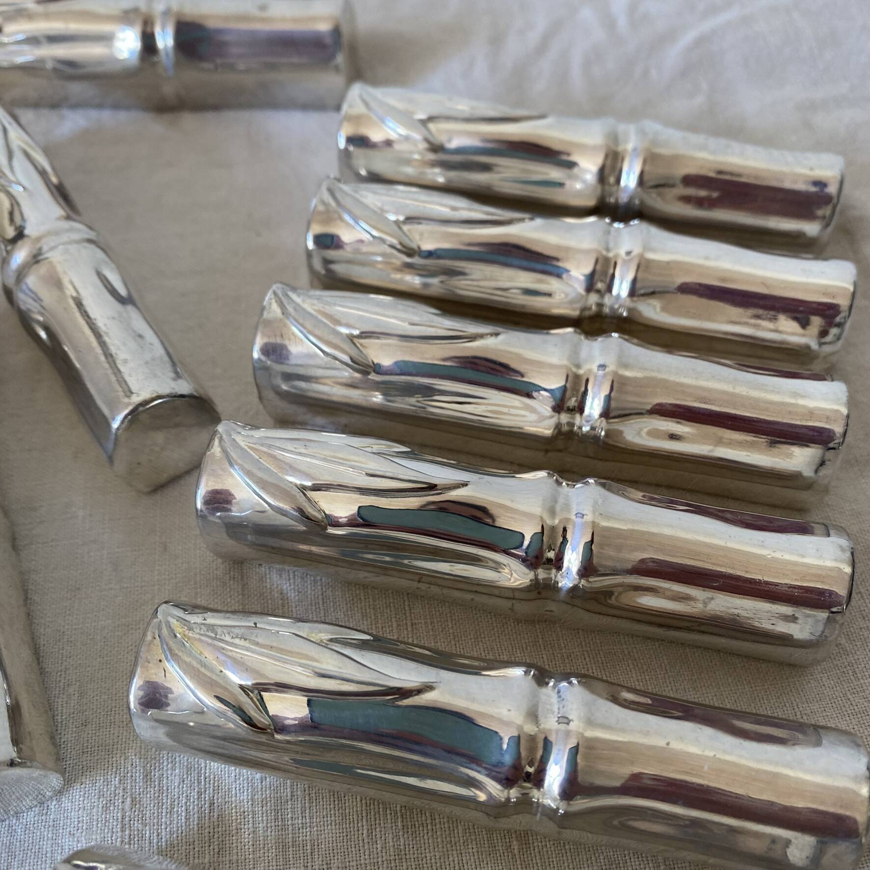 Silver bamboo knife rests from the 1980s.