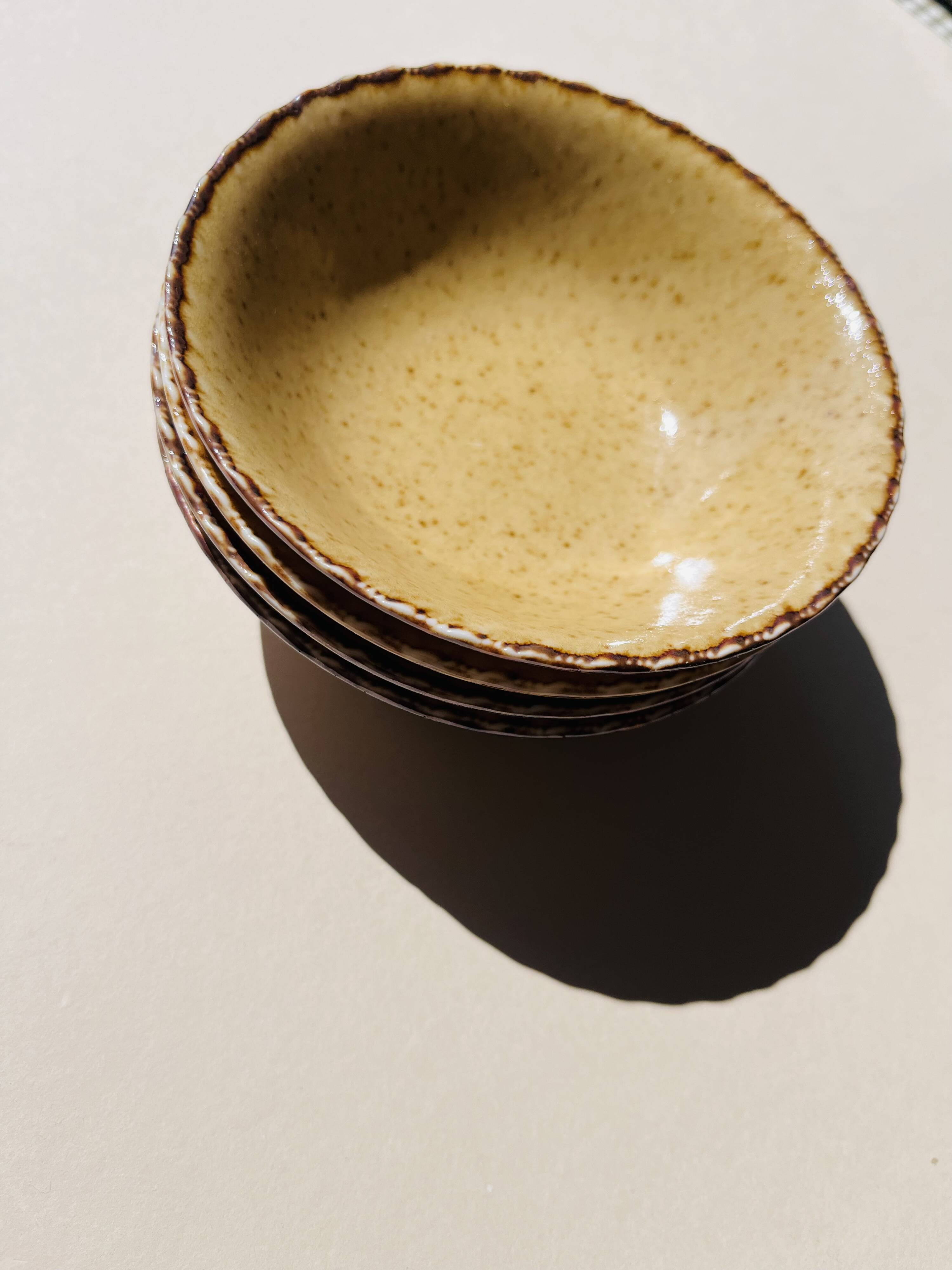 Set of 4 sand ceramic bowls