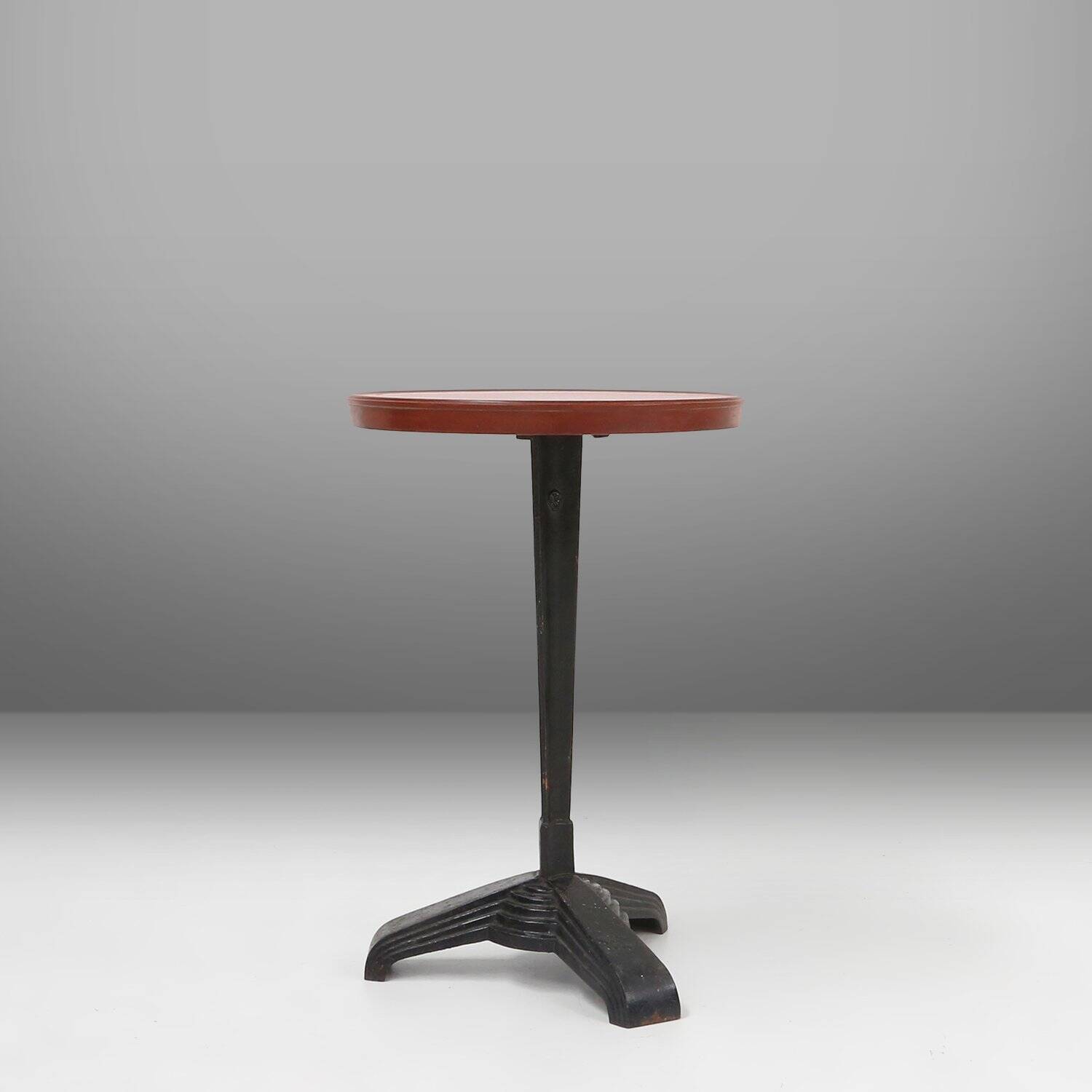 Cast Iron Bistro Table with Bakelite Top from Louis Vuitton, France, 1930s