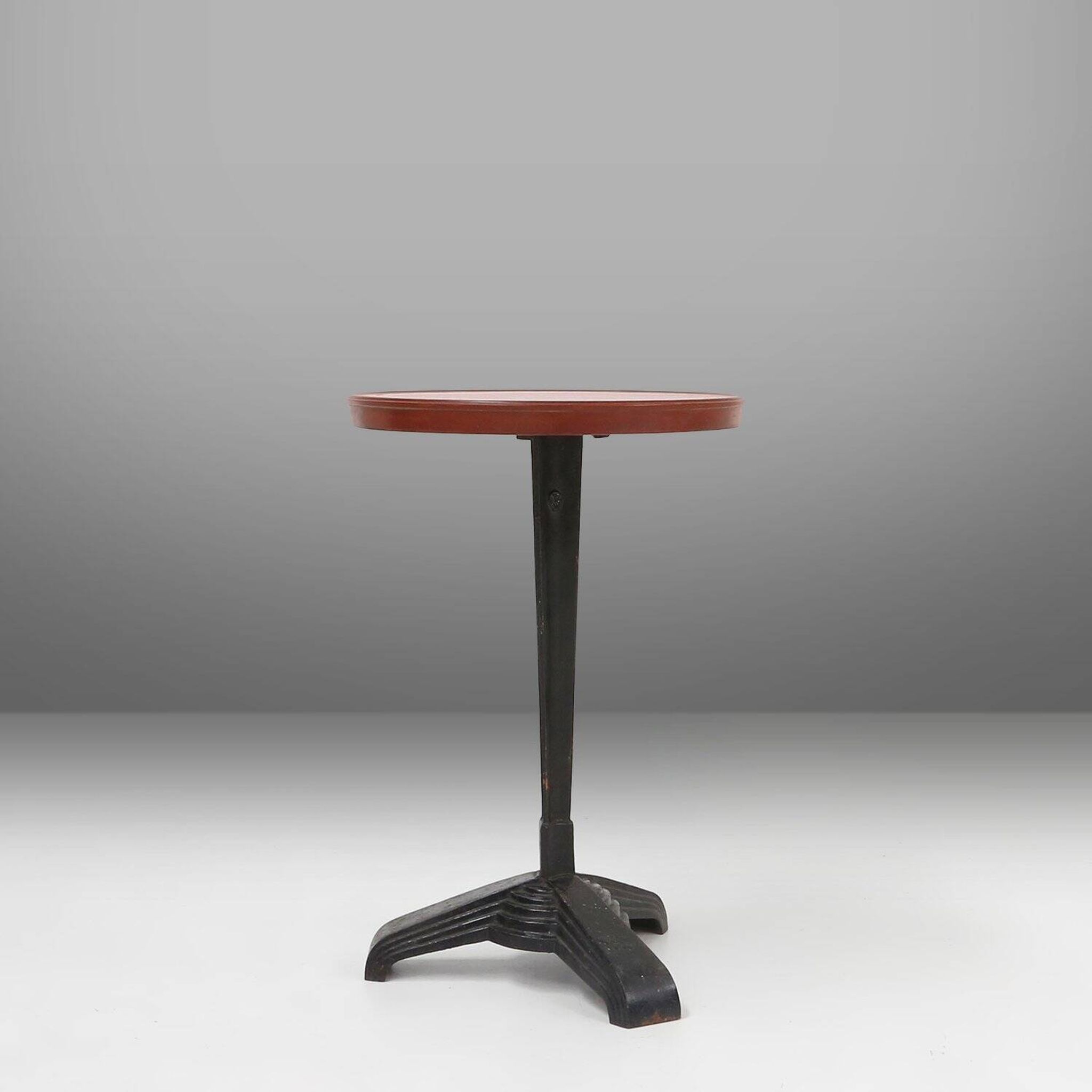 Cast Iron Bistro Table with Bakelite Top from Louis Vuitton, France, 1930s