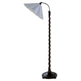 Organic whirlwind floor lamp in stained birch, Sweden, 1940s.