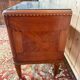 Art Deco walnut and black marble commode from the 1960s.