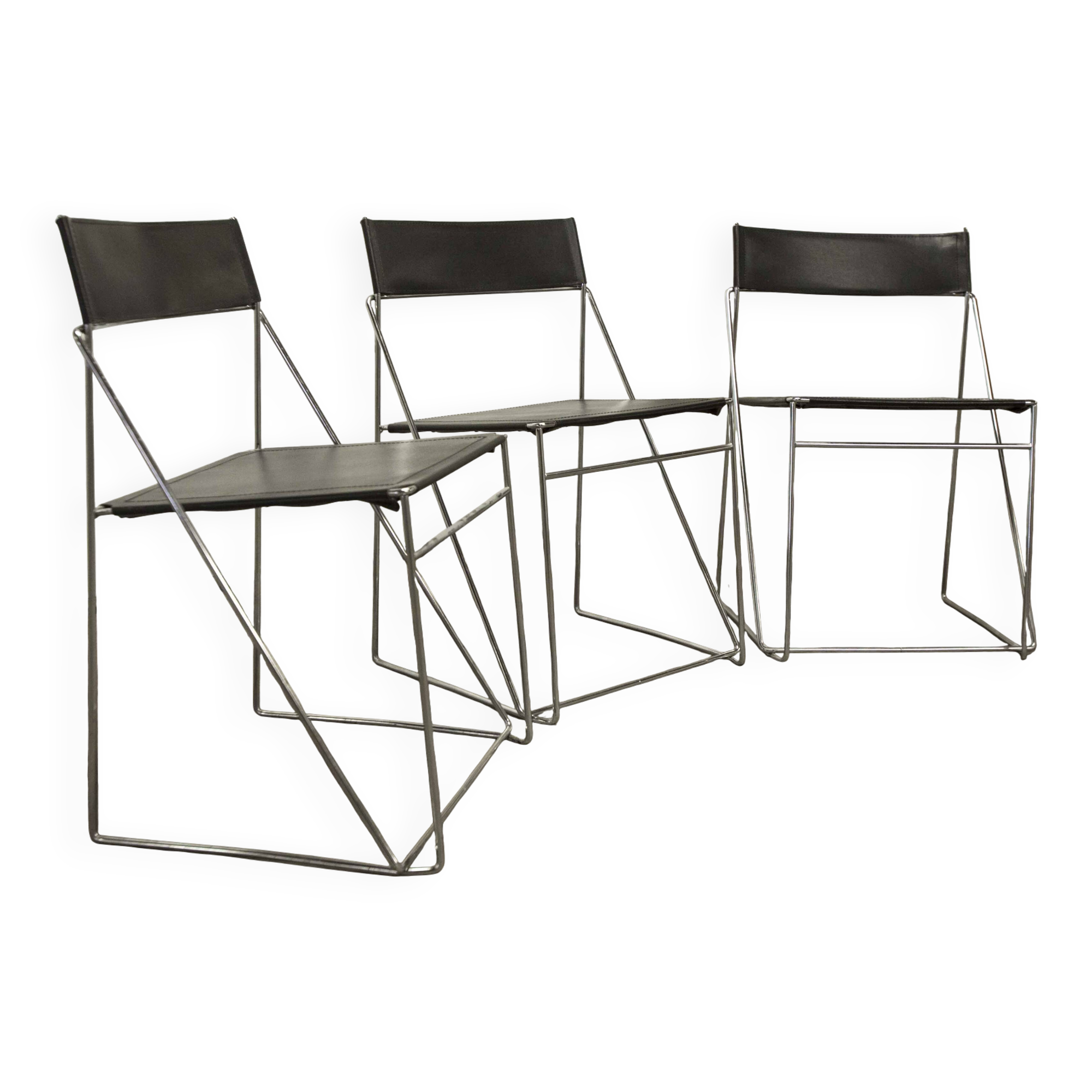 Set of 3 minimalist X line chairs by Niels Jorgen Haugesen.