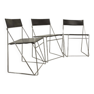 Set of 3 minimalist X line chairs by Niels Jorgen Haugesen.