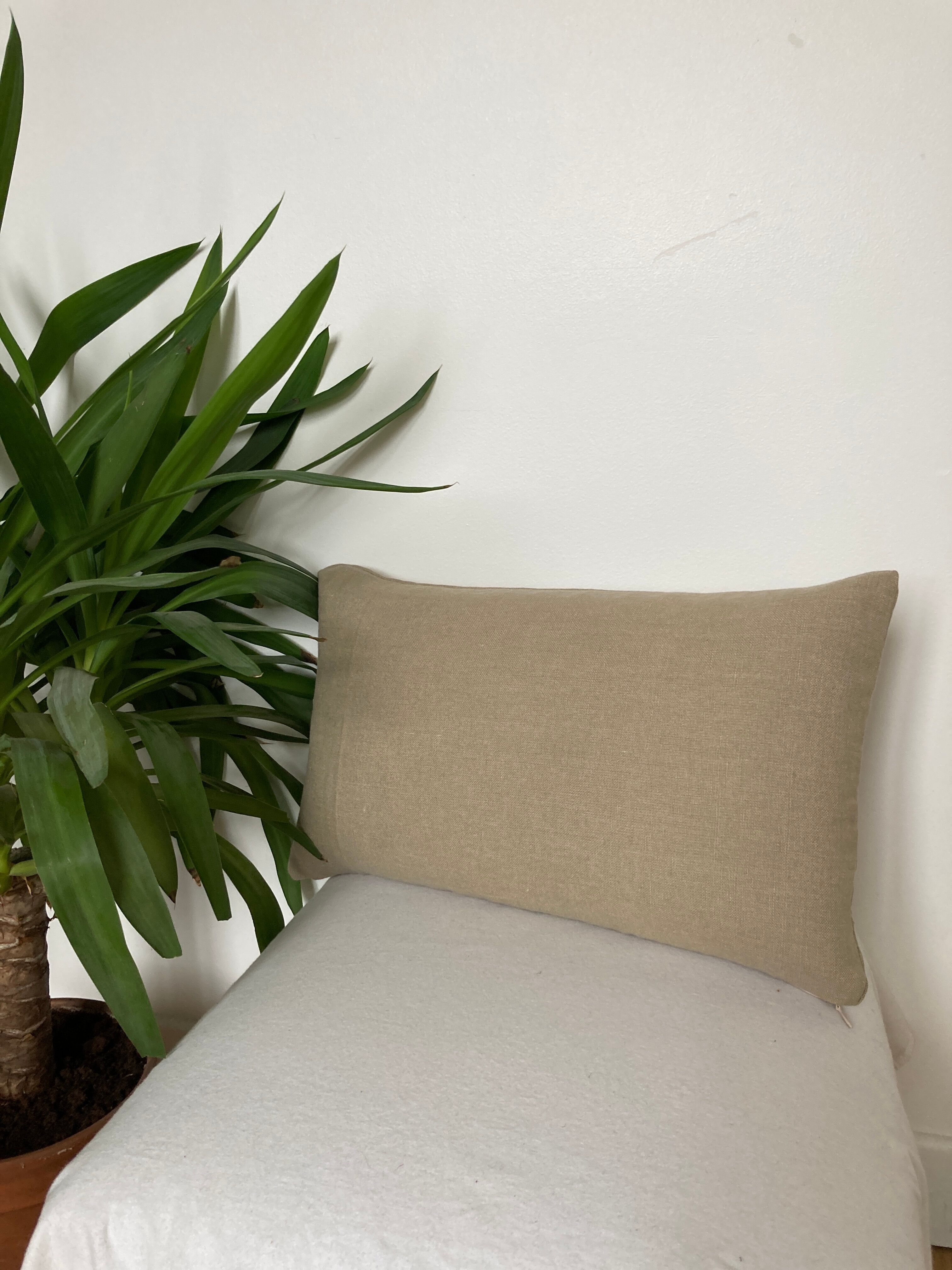 Plain beige linen cushion