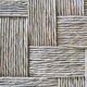 Wooden stool seated in braided rope
