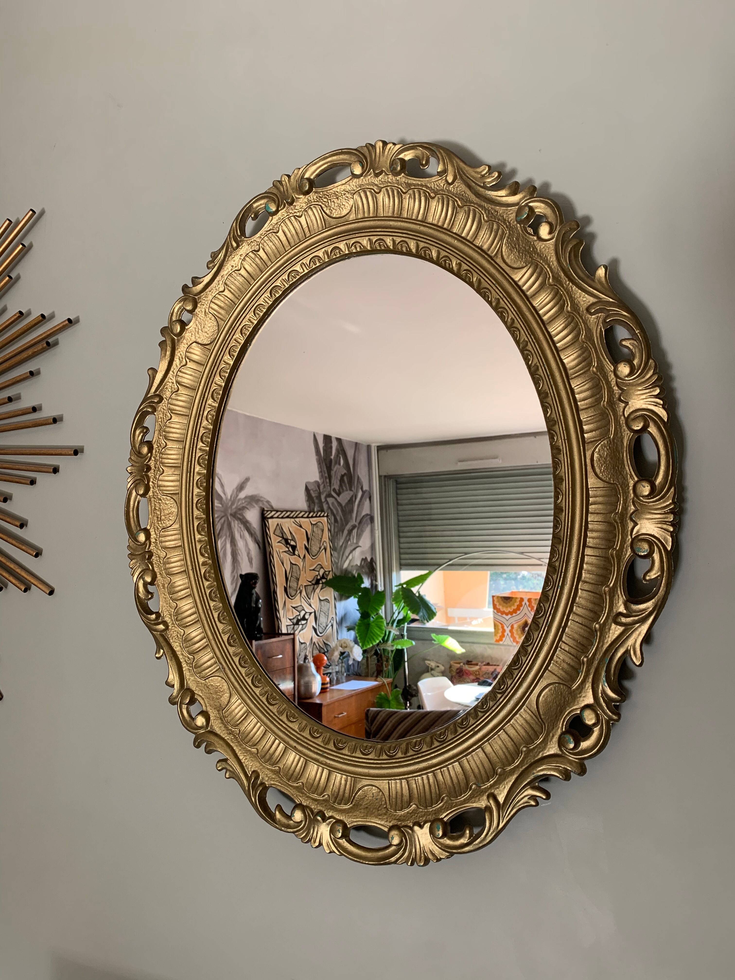 Miroir ovale doré années 70