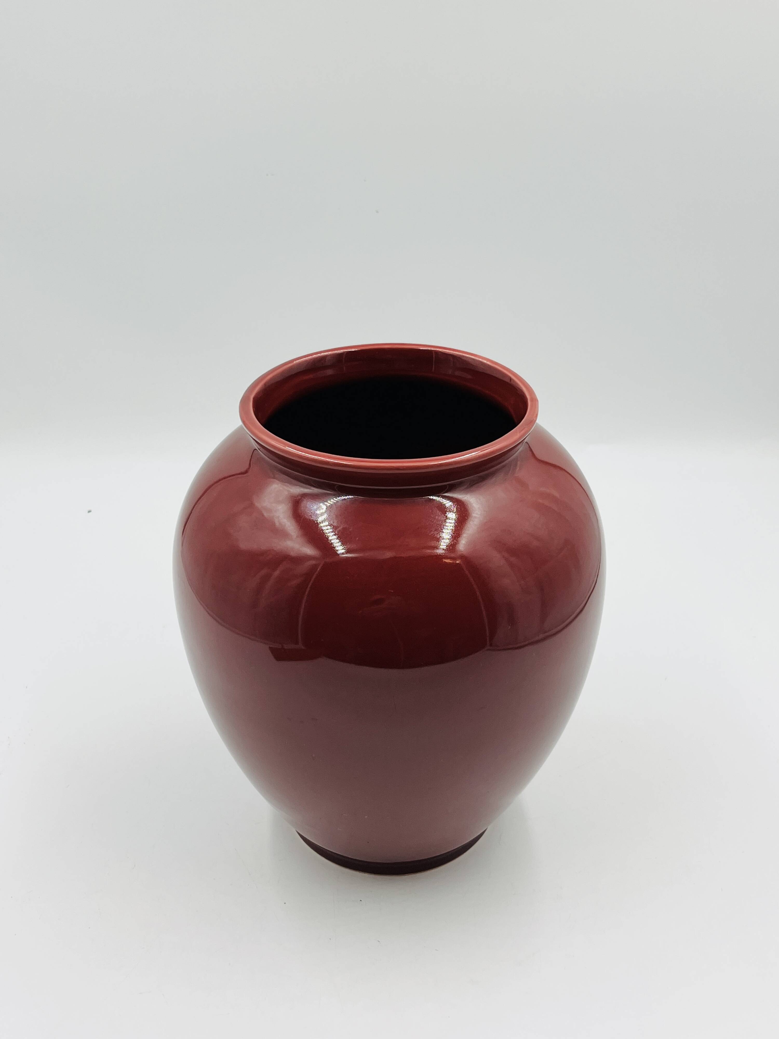 Vintage vase in glazed burgundy ceramic