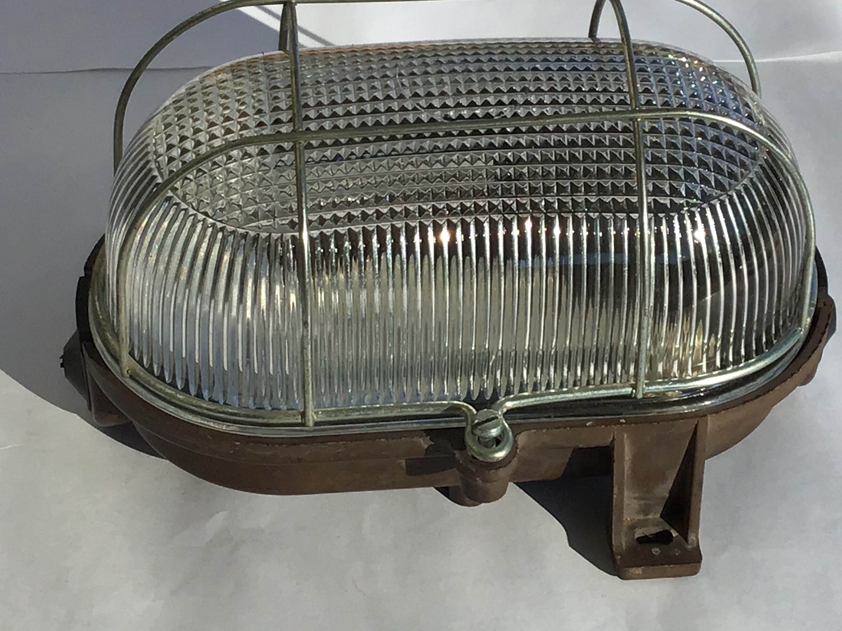 Industrial sconce hublot oval bakelite base