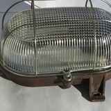 Industrial sconce hublot oval bakelite base