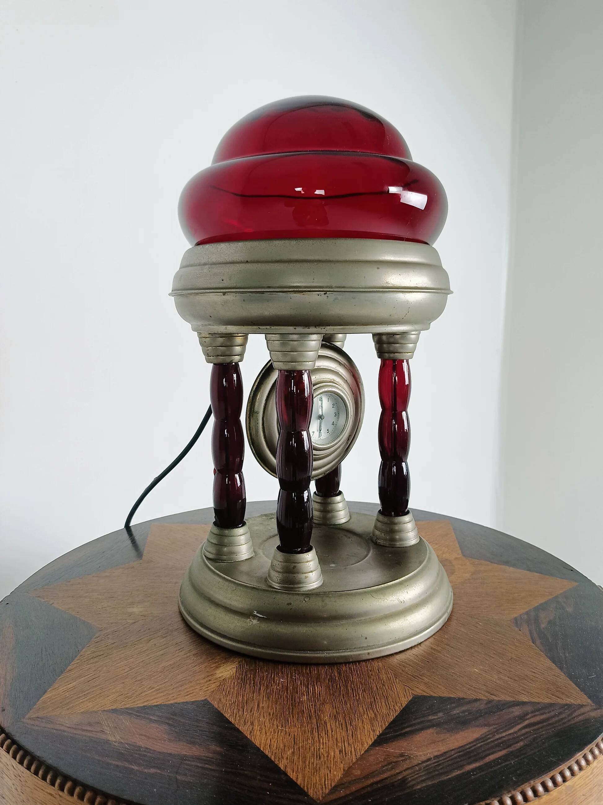 Unique vintage tin lamp with clockwork
