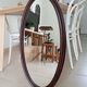 Oval antique mirror in solid wood from the 1960s.
