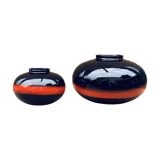 A pair of black and red spherical vases by Bay Keramik, West Germany, from the 1960s.